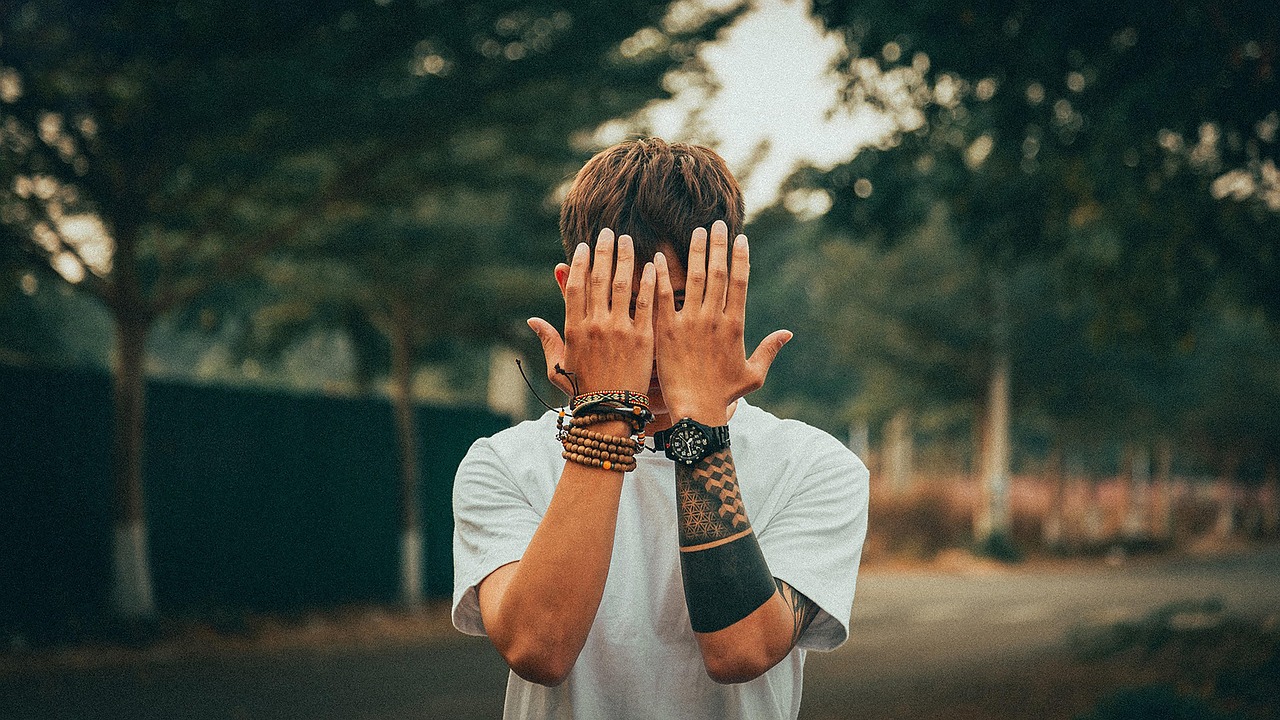 man, hiding face, shy, tattoo, hands, outdoors, shy, shy, shy, shy, shy