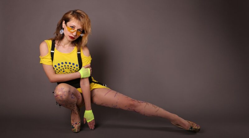 woman, fashion, retro, street style, style, yellow dress, glasses, mlg glasses, pose, punk, legs, shoes, heels, young woman, 1980, brightly, image, posing, sitting, stretch your leg, vintage, trash, graffiti, punk, punk, punk, punk, trash, trash, trash, trash, trash, graffiti, graffiti